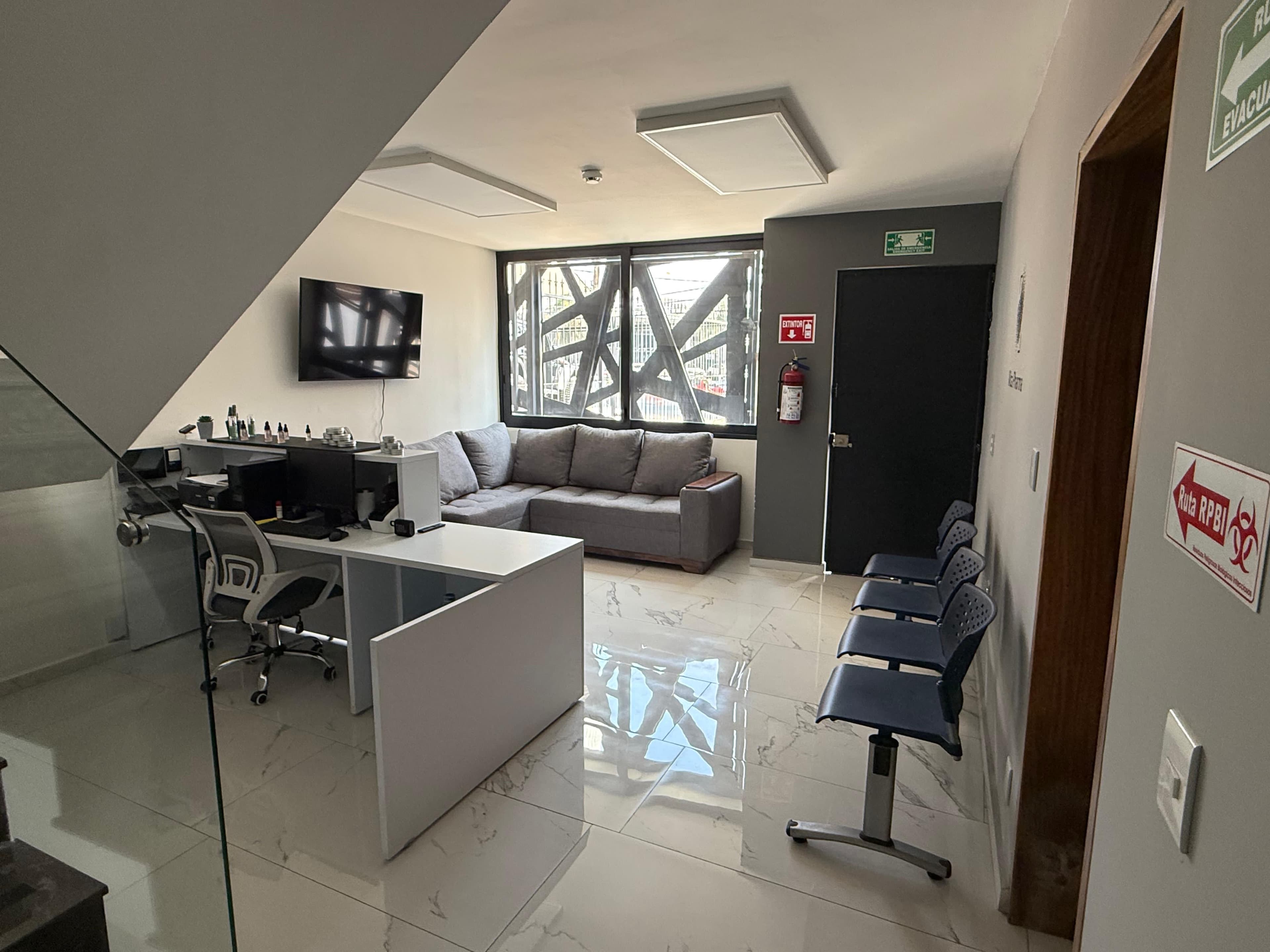 A doctor in a consultation with a patient, explaining a diagnosis.