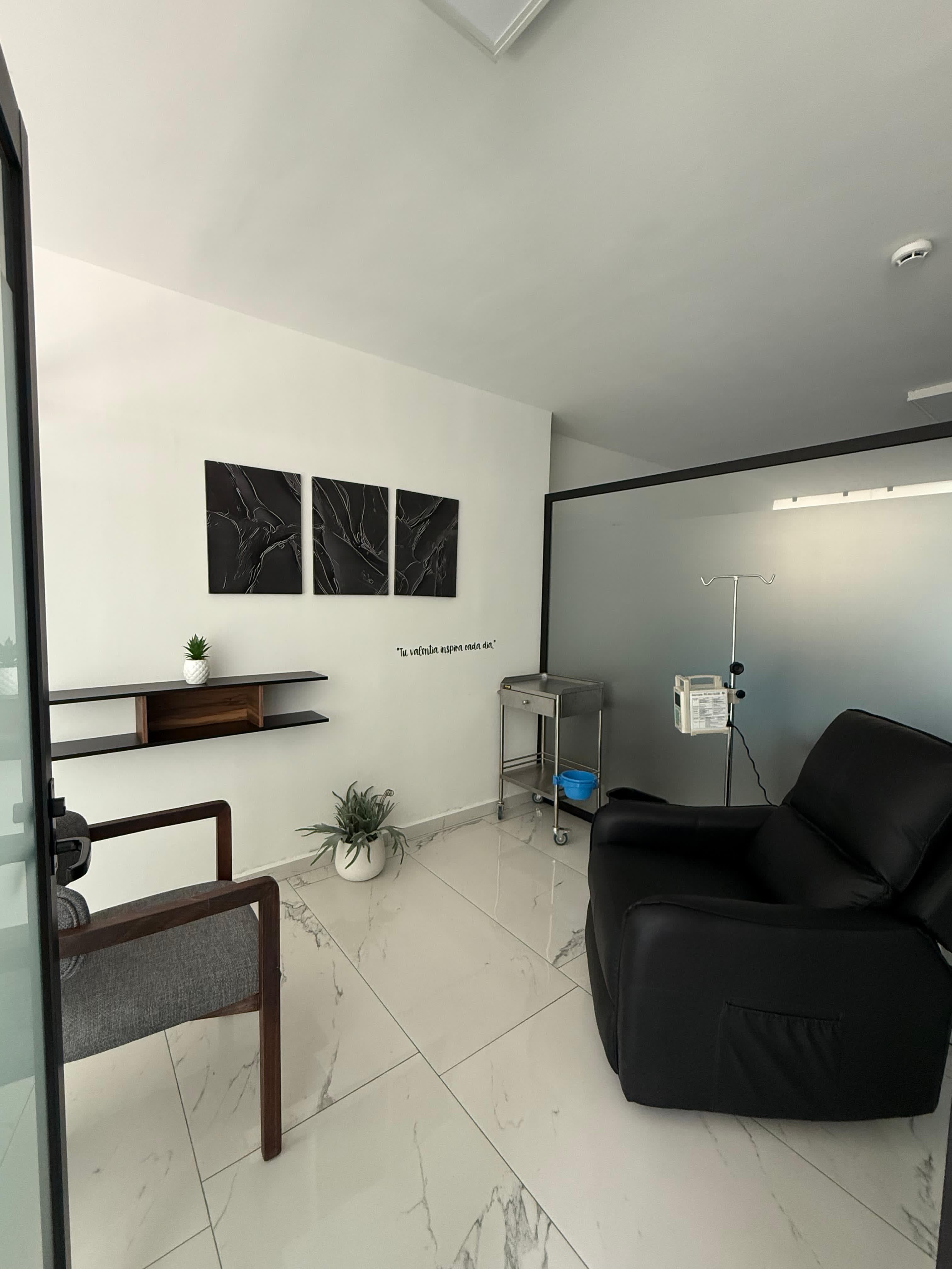 A compassionate nurse attending to a patient during an infusion.